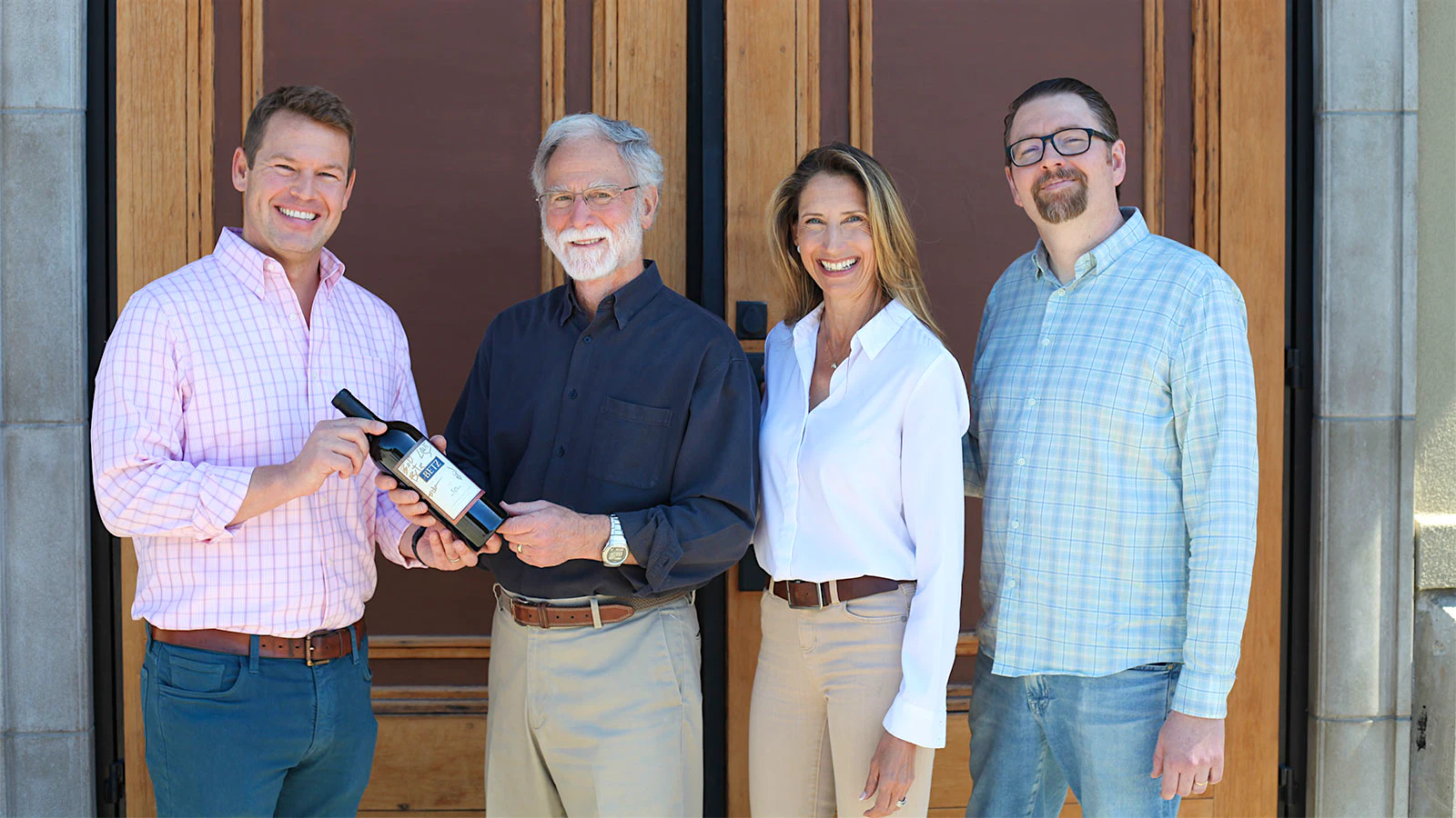 New owner Brandon Ackley, founder Bob Betz, previous owner Bridgit Griessel and longtime winemaker Louis Skinner.